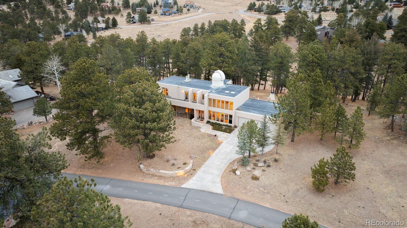 1551 Genesee Ridge Road Golden, CO 80401 - Photo 41 of 50 an aerial view of a house with a yard basket ball court and outdoor seating