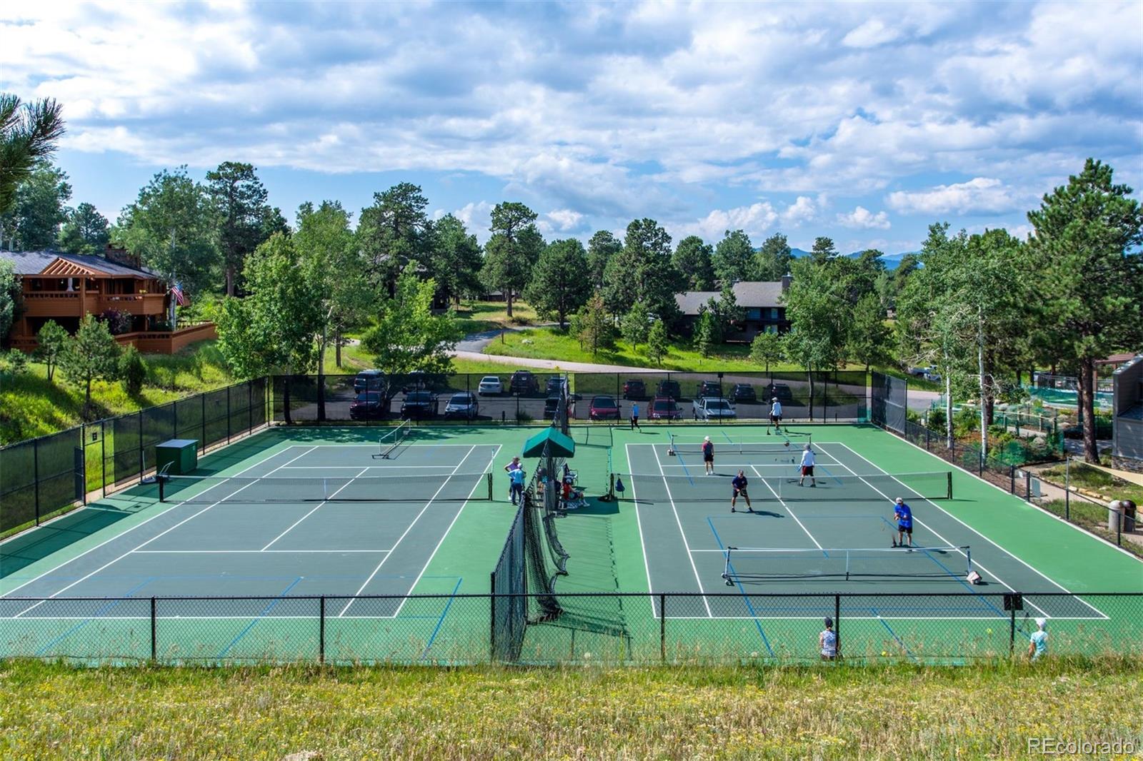 1551 Genesee Ridge Road Golden, CO 80401 - Photo 47 of 50 a view of a tennis court