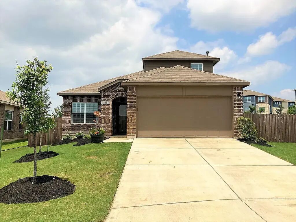 1511 Cedrus Road Cedar Park, TX 78613 - Photo 1 of 1 View of front of home featuring brick siding, a garage, concrete driveway, and a shingled roof