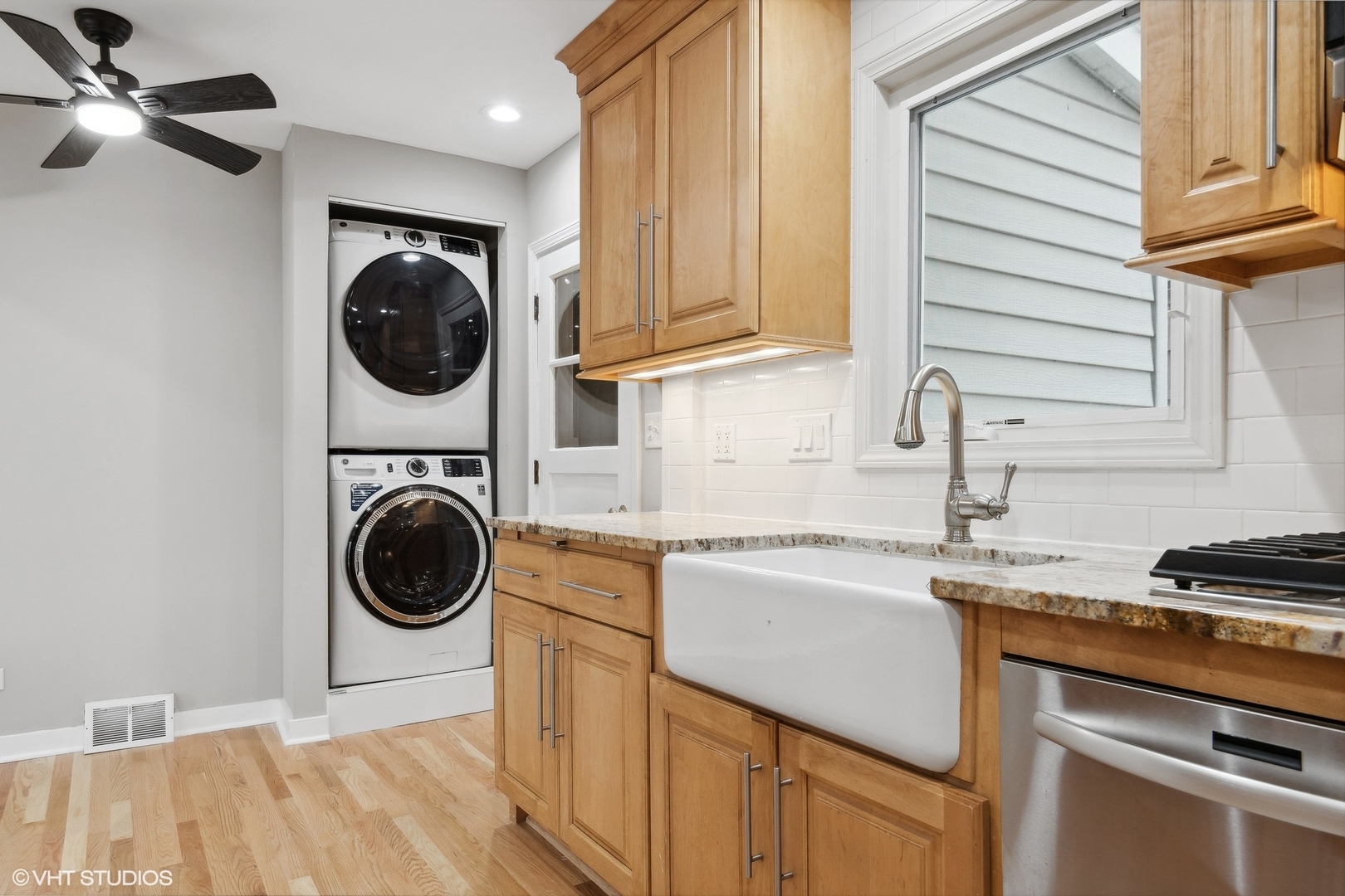 2490 Green Bay Road, Unit 1 Highland Park, IL 60035 - Photo 6 of 18 a kitchen with a stove top oven sink and cabinets