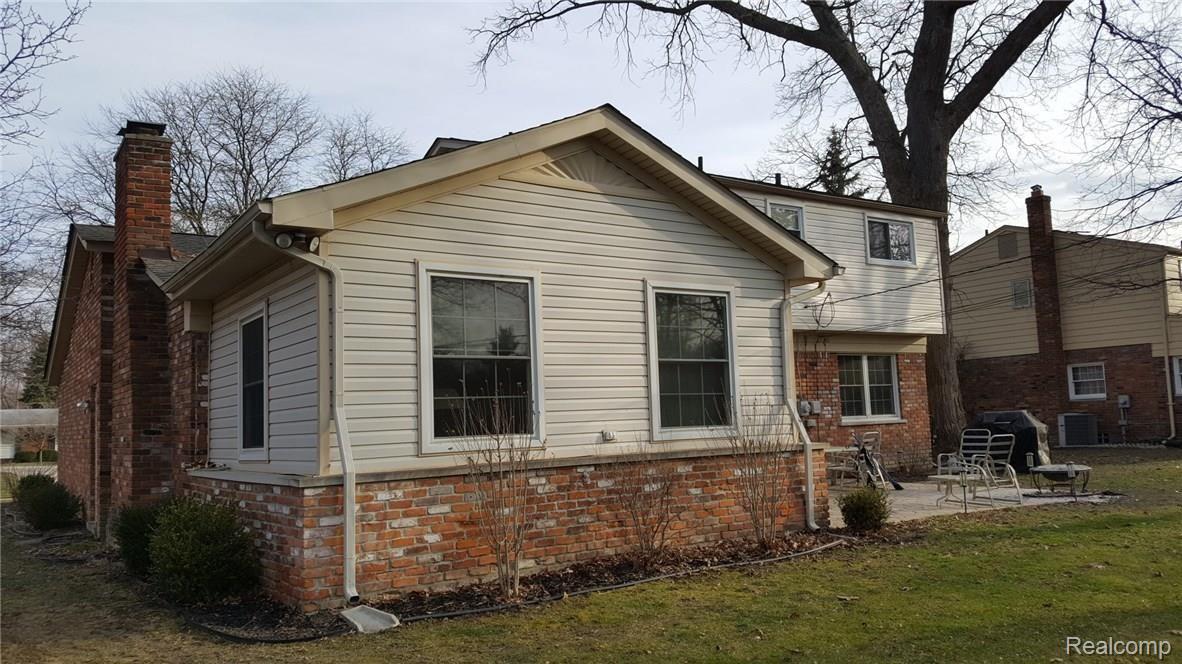 8463 Hampton Road Grosse Ile, MI 48138 - Photo 3 of 37 Rear elevation with addition