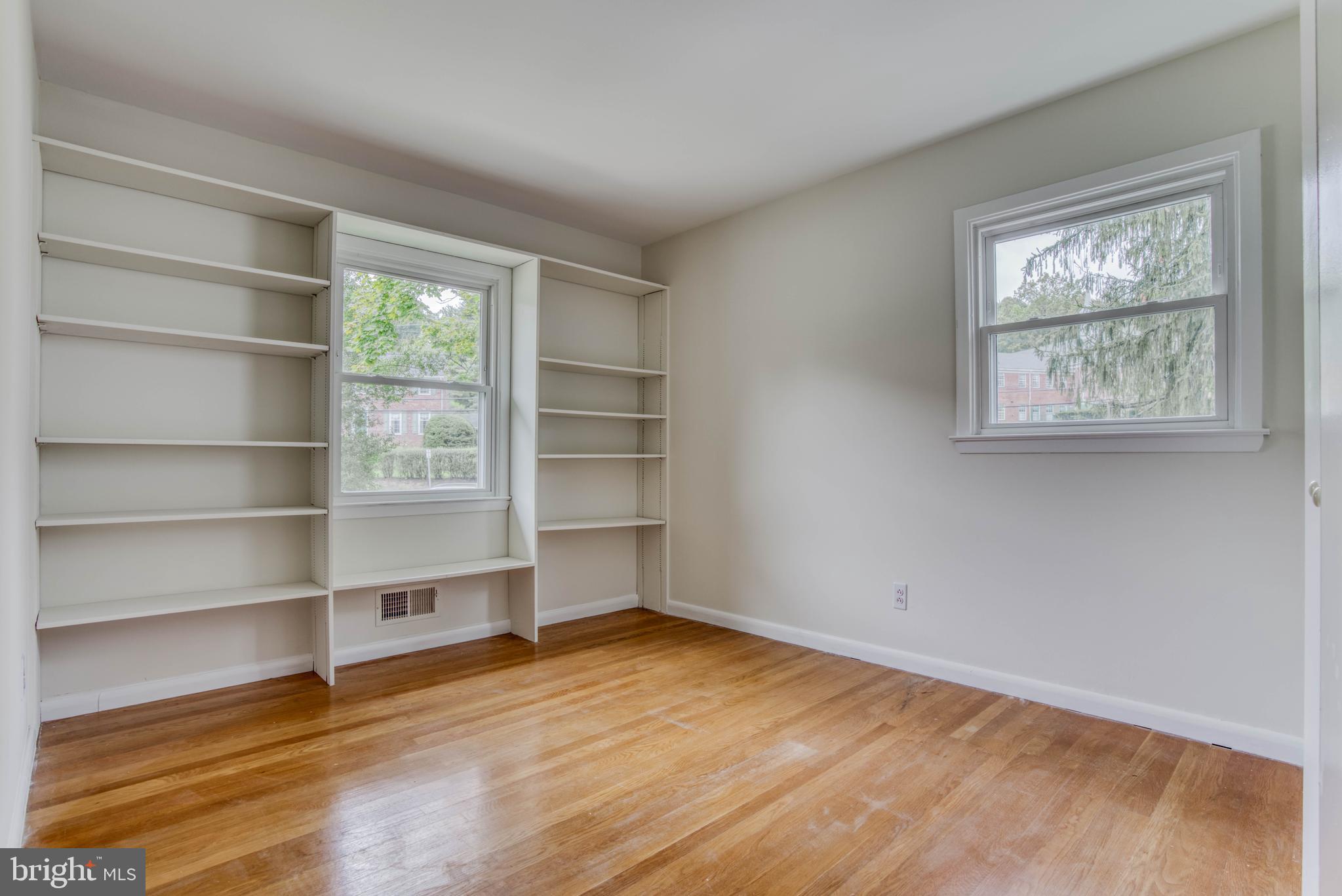 300 West Timonium Road Lutherville-Timonium, MD 21093 - Photo 25 of 50 Third bedroom with built- in shelving