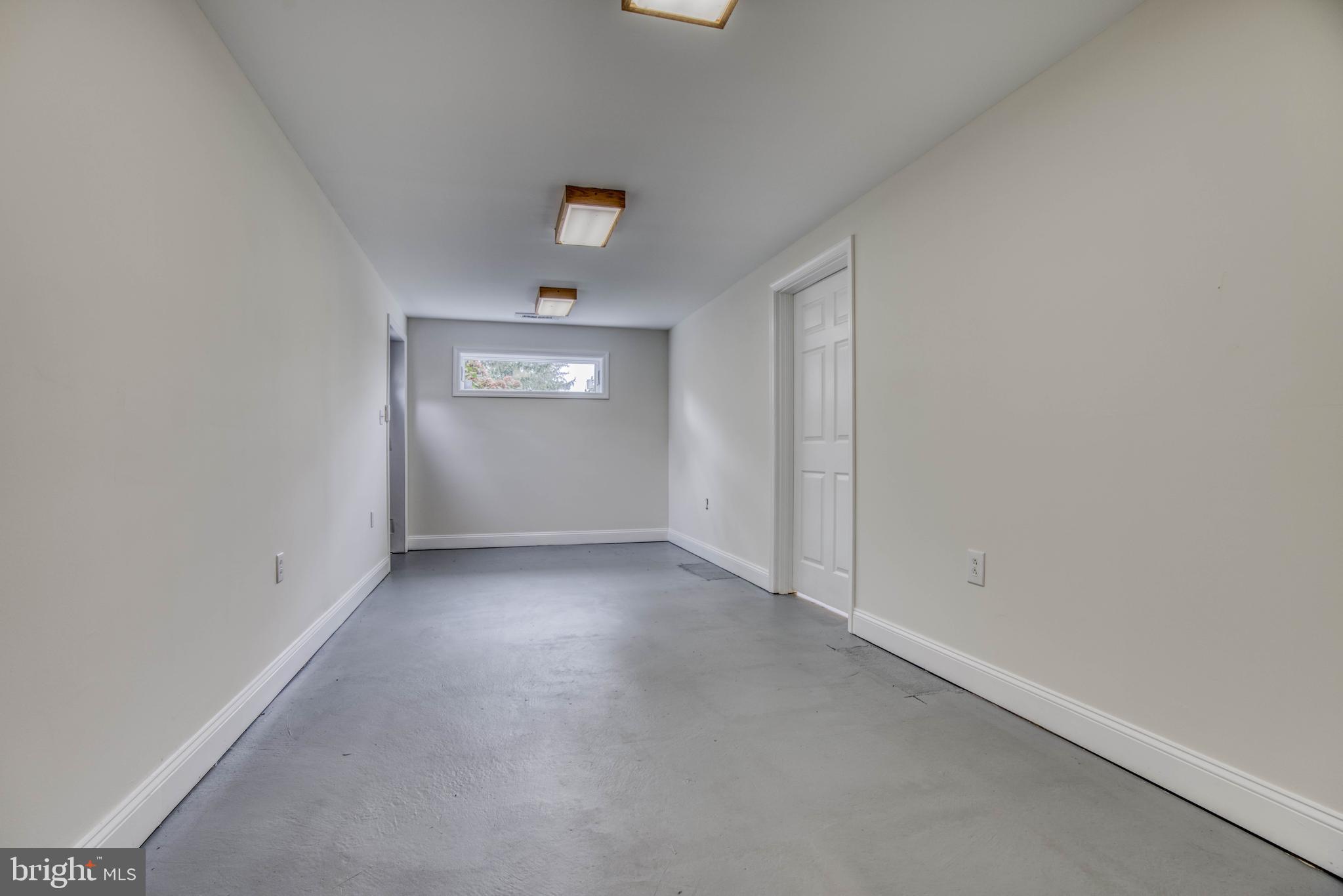 300 West Timonium Road Lutherville-Timonium, MD 21093 - Photo 47 of 50 This area goes beyond the family room-huge