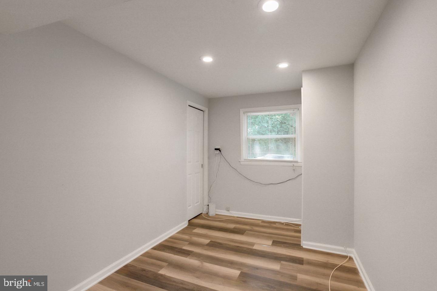 5504 Keppler Road Temple Hills, MD 20748 - Photo 11 of 19 a view of empty room with window