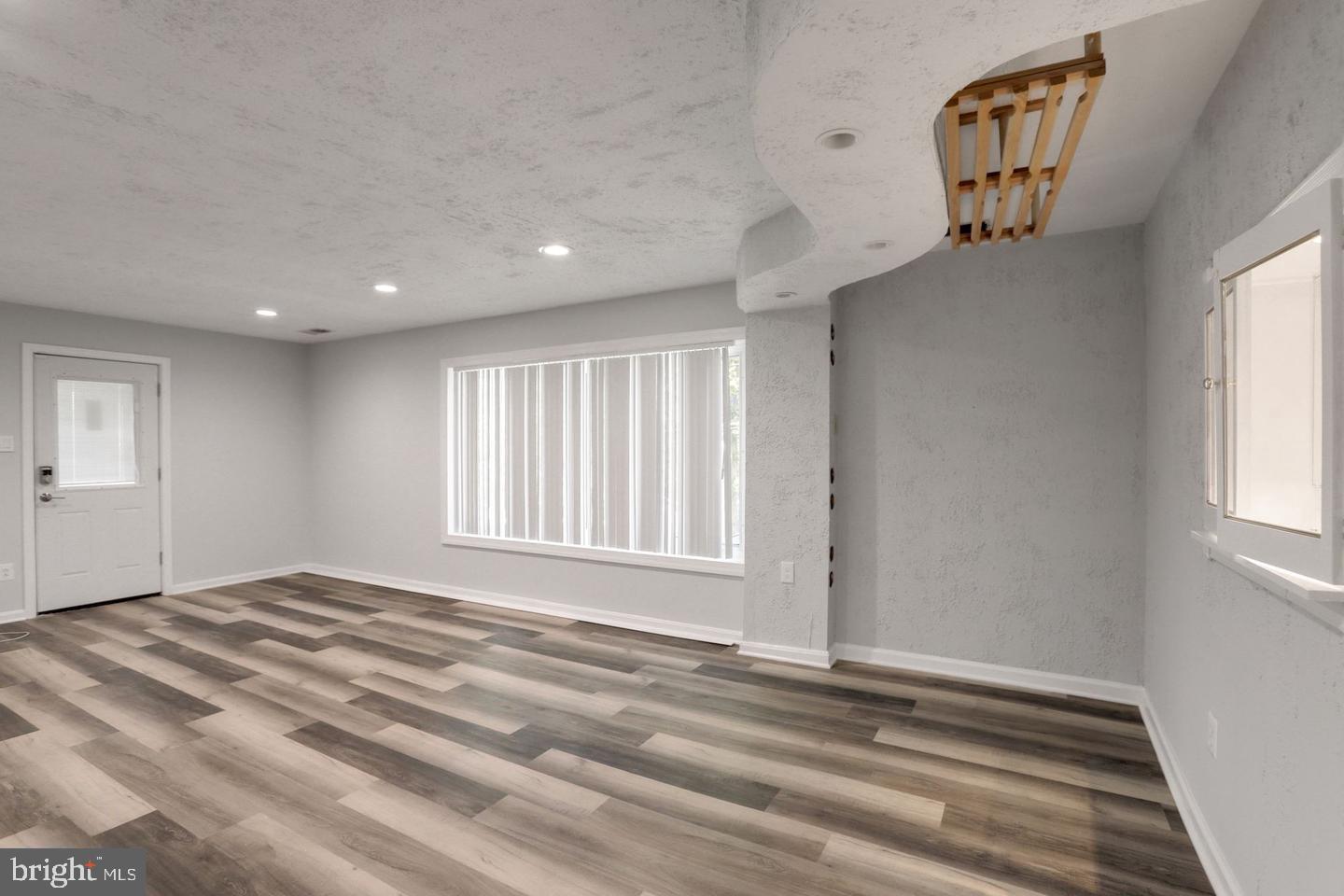 5504 Keppler Road Temple Hills, MD 20748 - Photo 13 of 19 a view of an empty room with a window