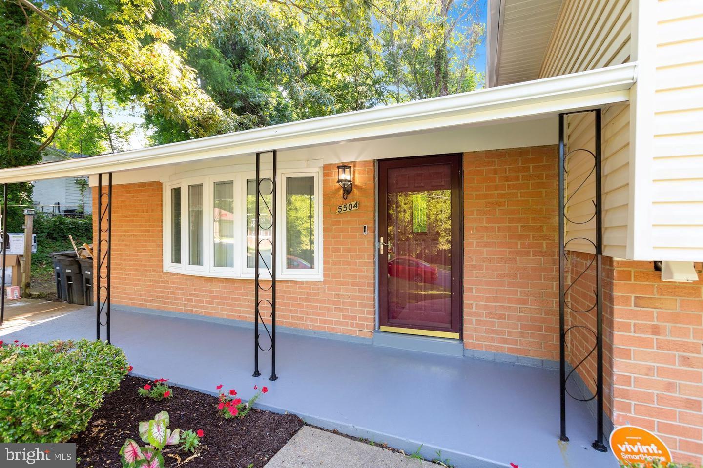 5504 Keppler Road Temple Hills, MD 20748 - Photo 2 of 19 a front view of a house with a porch