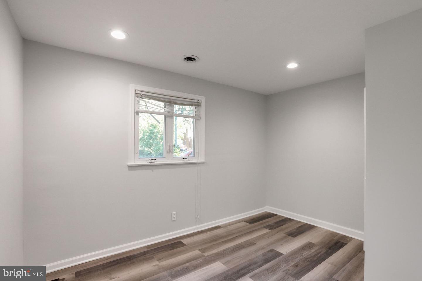 5504 Keppler Road Temple Hills, MD 20748 - Photo 10 of 19 an empty room with a window