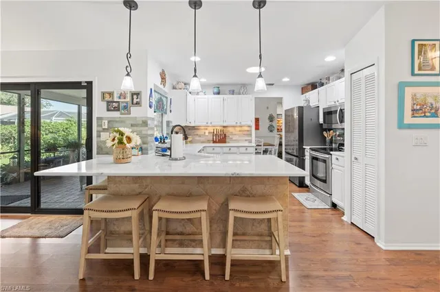 $455,000 | 9967 Country Oaks Drive, Fort Myers, FL 33967