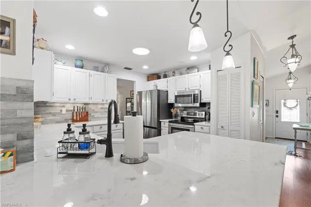 $455,000 | 9967 Country Oaks Drive, Fort Myers, FL 33967