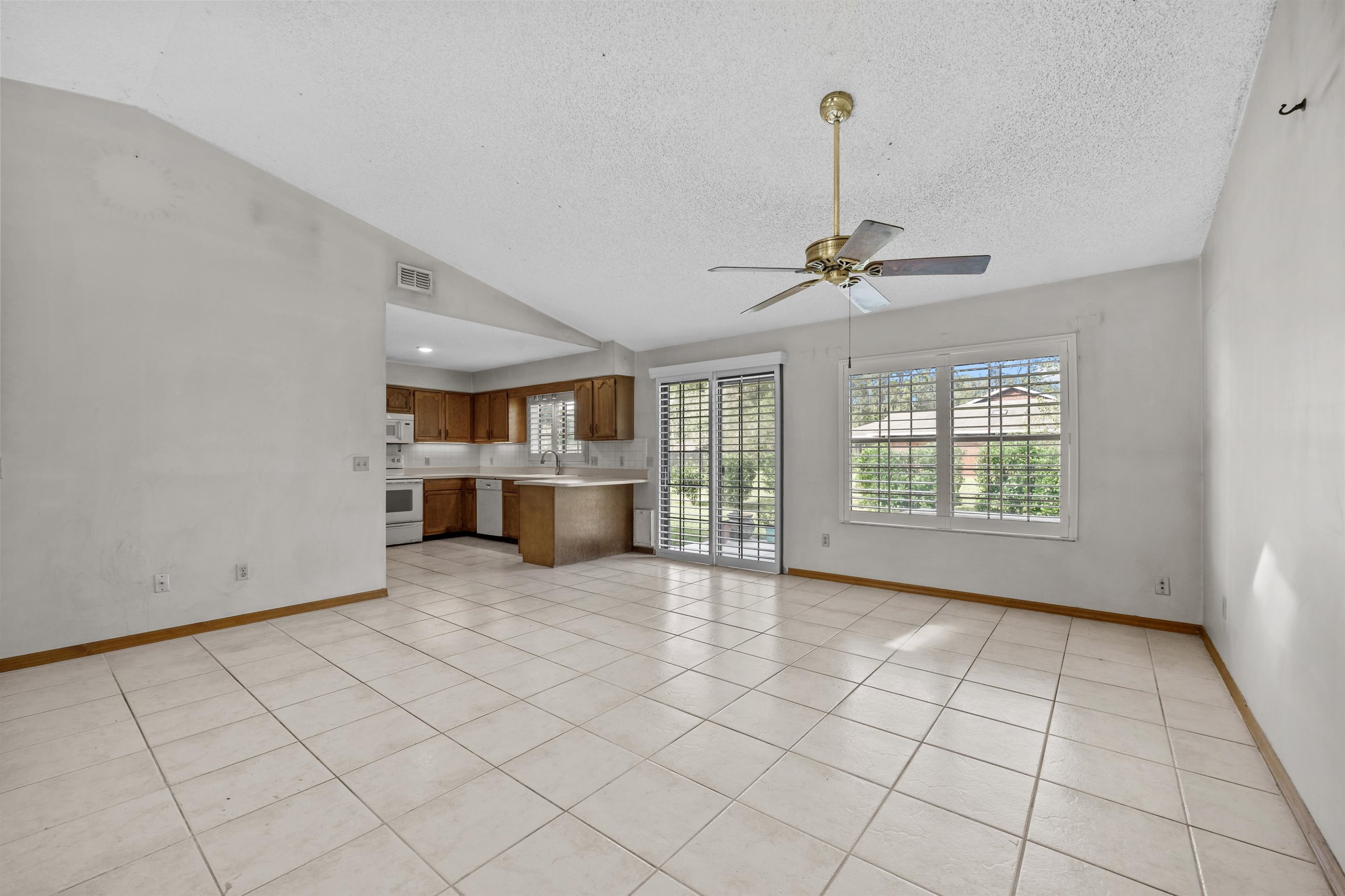 240 Watson Road St. Augustine, FL 32086 - Photo 11 of 43 a view of empty room with cabinet and window