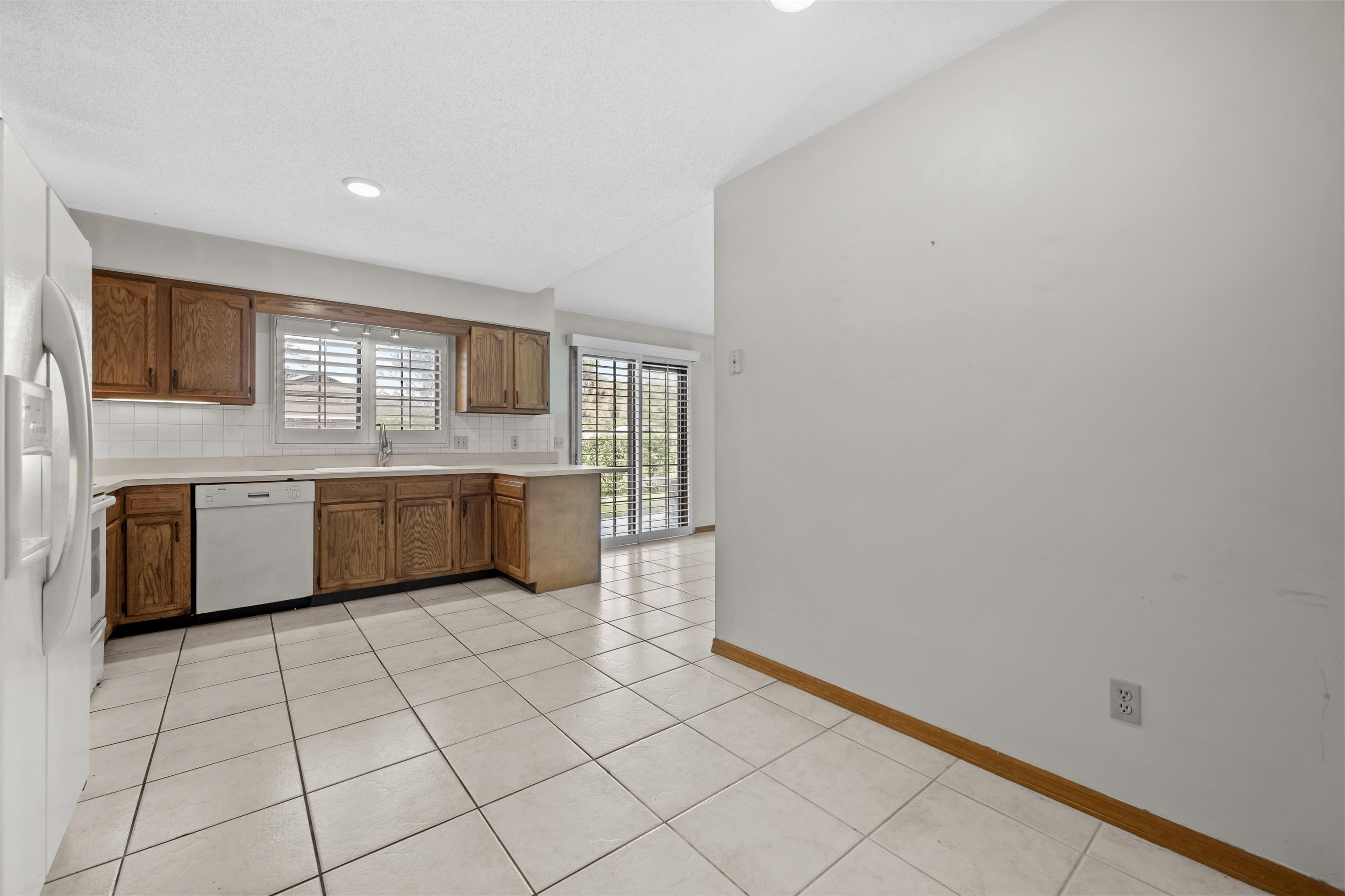 240 Watson Road St. Augustine, FL 32086 - Photo 16 of 43 a view of a kitchen with a sink