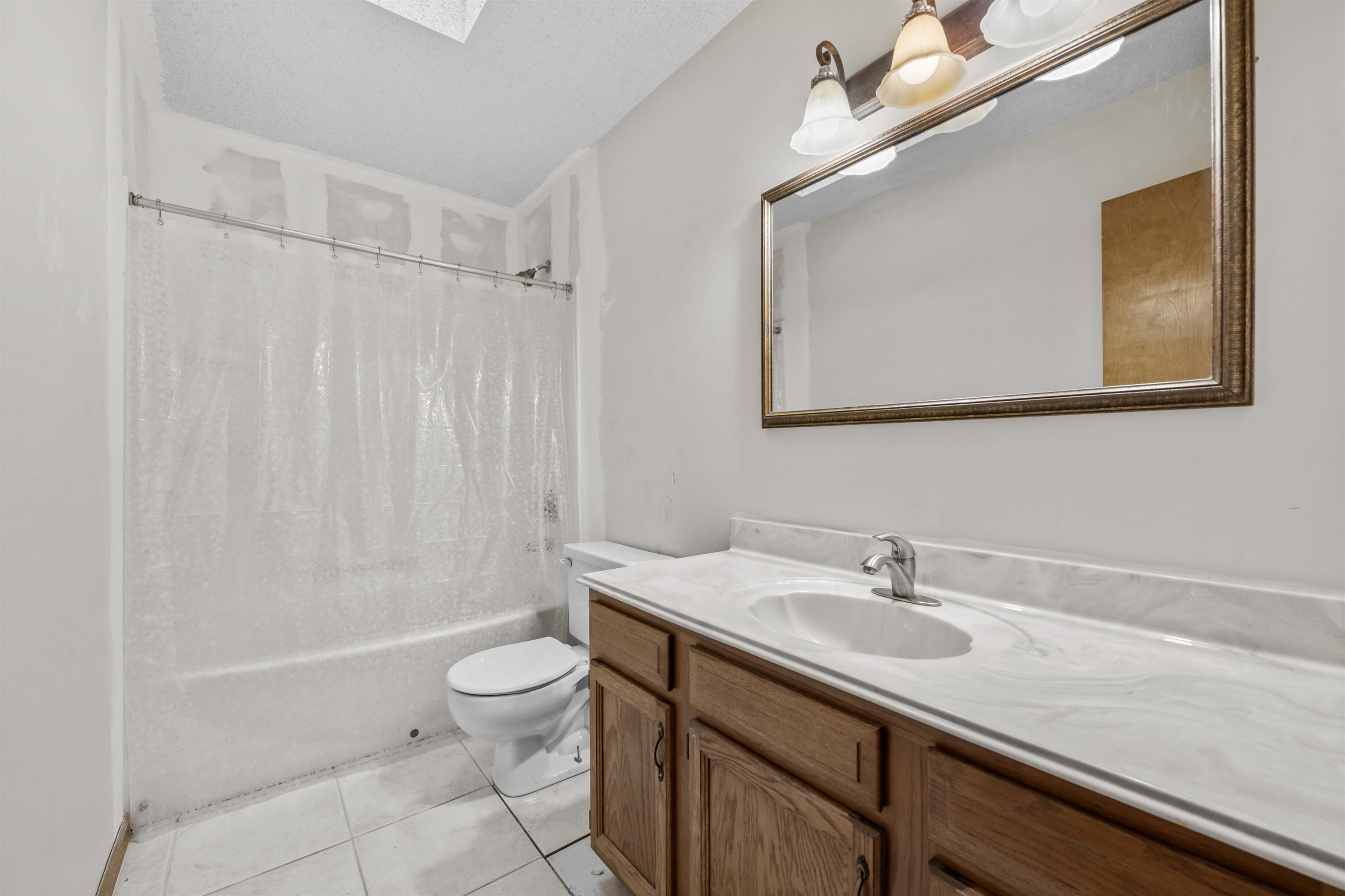 240 Watson Road St. Augustine, FL 32086 - Photo 23 of 43 a bathroom with a sink a toilet and shower
