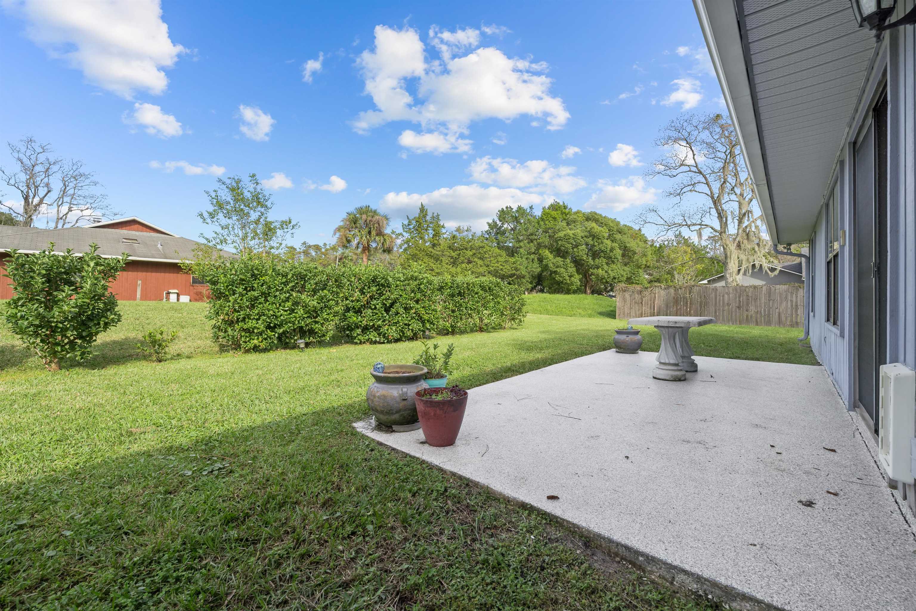 240 Watson Road St. Augustine, FL 32086 - Photo 29 of 43 a view of a patio with a yard
