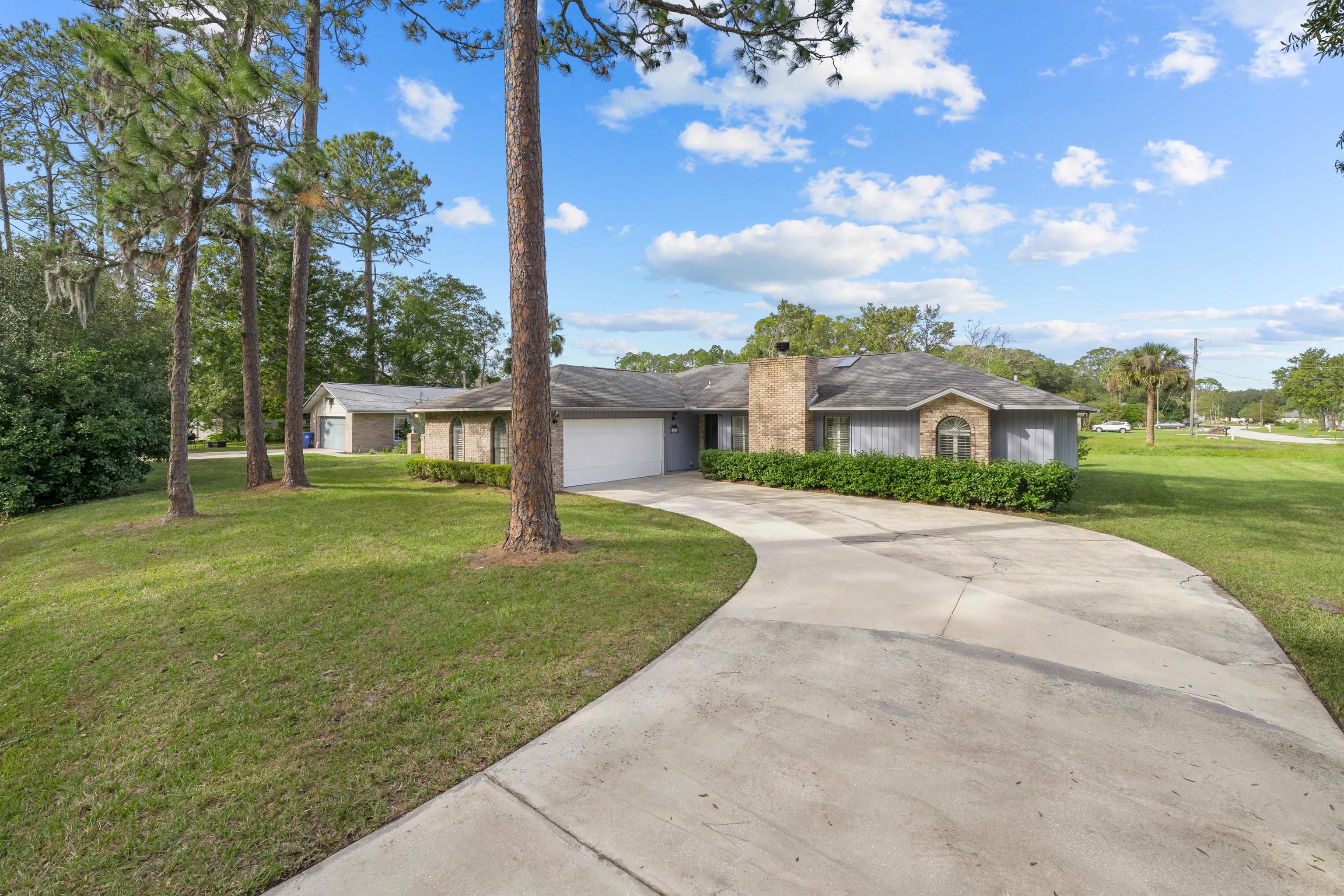 240 Watson Road St. Augustine, FL 32086 - Photo 34 of 43 a view of a house with a big yard