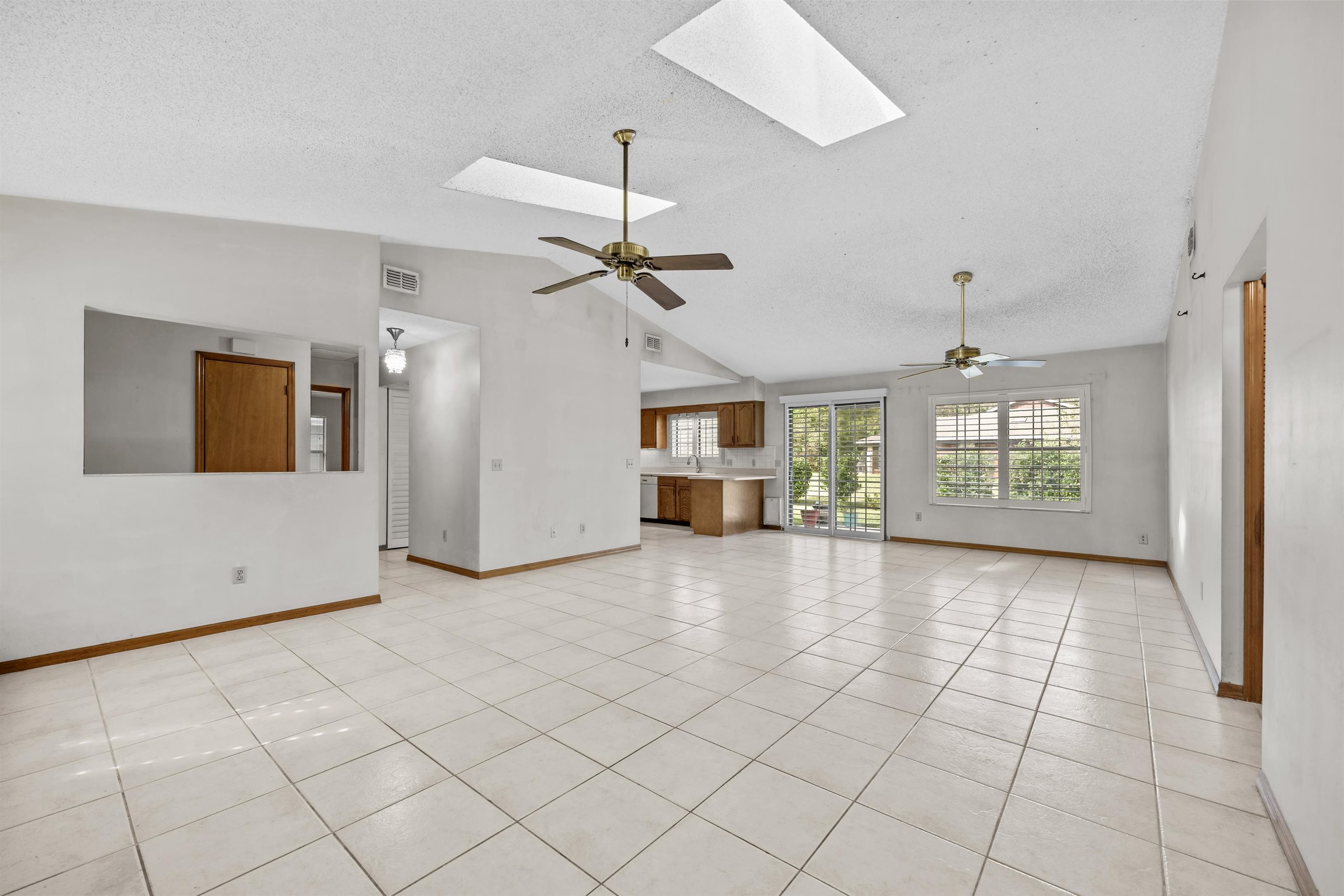 240 Watson Road St. Augustine, FL 32086 - Photo 8 of 43 a view of an empty room with a window