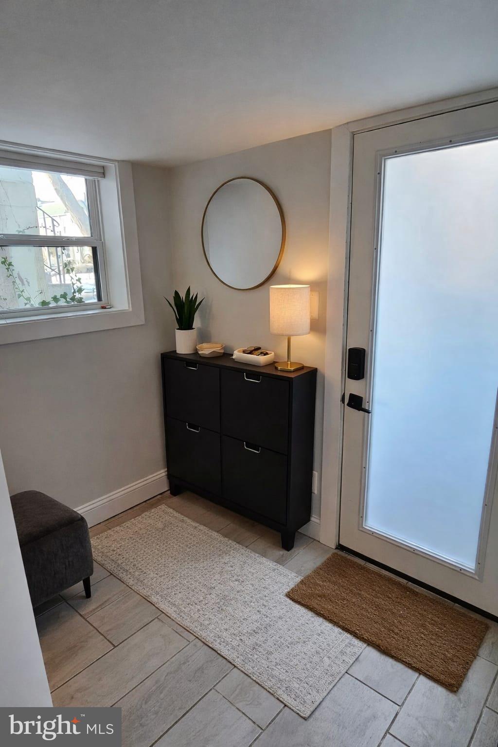 638 Rock Creek Church Road Northwest Washington, DC 20010 - Photo 5 of 5 a room with a mirror and a dresser