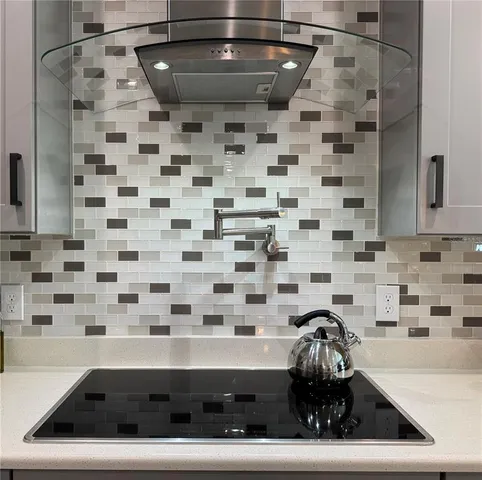 a bathroom with a sink and a washing machine