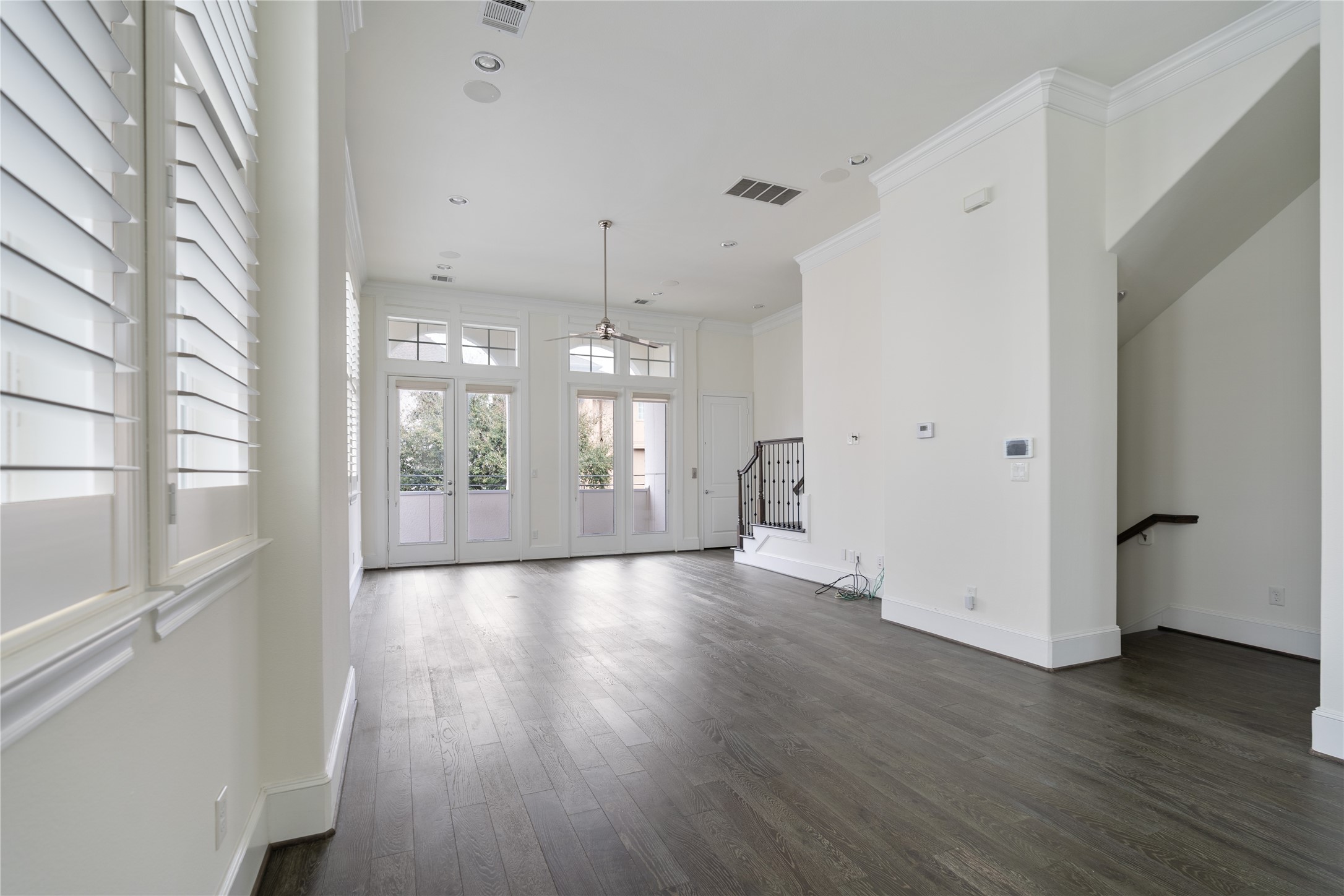 2613 Maxroy Street Houston, TX 77007 - Photo 12 of 42 Plantation shutters frame the windows and allow for adjustable natural light.