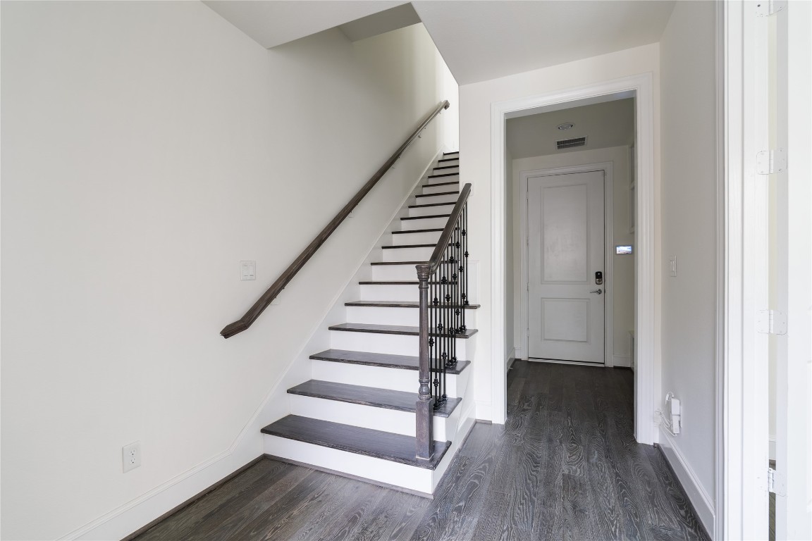 2613 Maxroy Street Houston, TX 77007 - Photo 34 of 42 Just beyond the entry, a thoughtfully designed mudroom area provides seamless transition to the attached two-car garage.