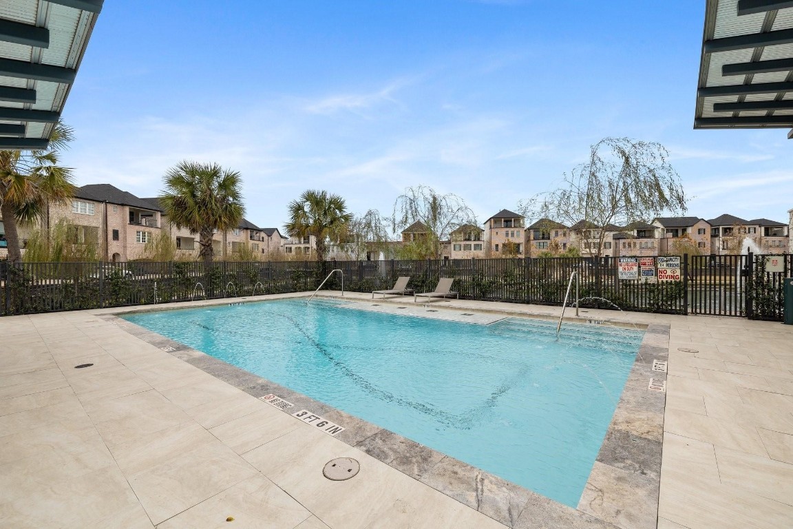 2613 Maxroy Street Houston, TX 77007 - Photo 37 of 42 The sparkling community pool is a must-have for Houston summers & allows you to vacation & unwind without leaving home