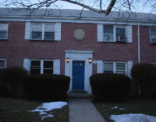 218 Seaton Road, Unit 1 Stamford, CT 06902 - Photo 1 of 1 a front view of a house with a yard