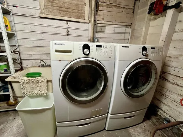 a utility room with dryer and washer