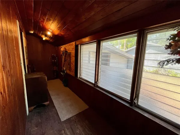 a view of balcony with furniture