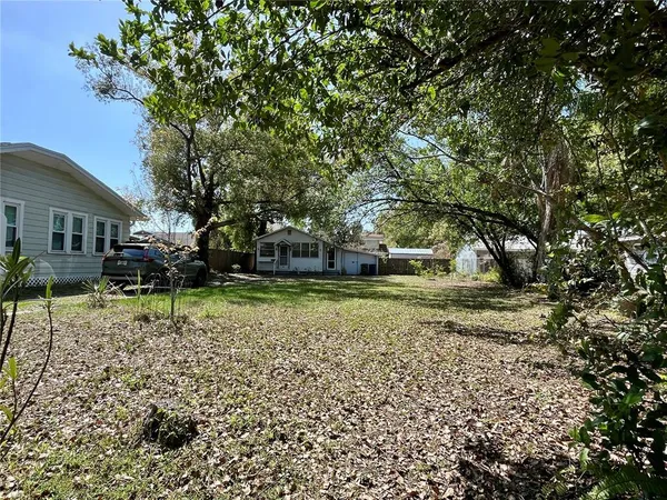 a house with trees in front of it