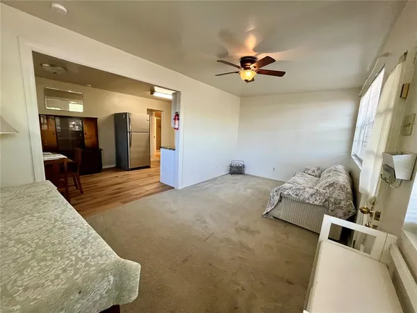 a view of a livingroom with a staircase