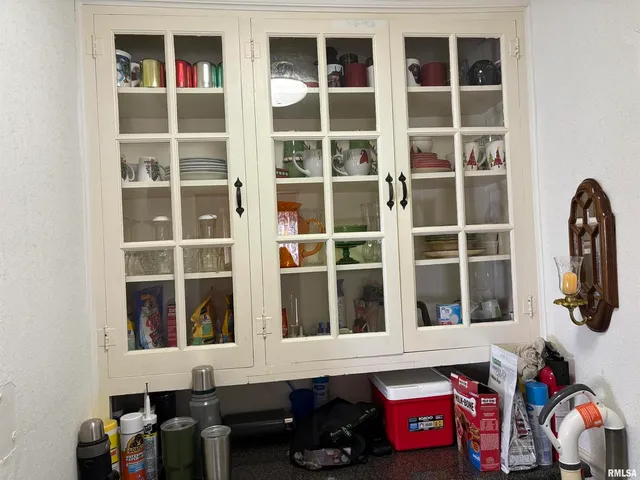 a room with furniture and a window