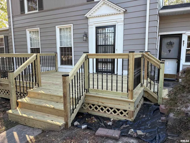 a view of a house with a deck