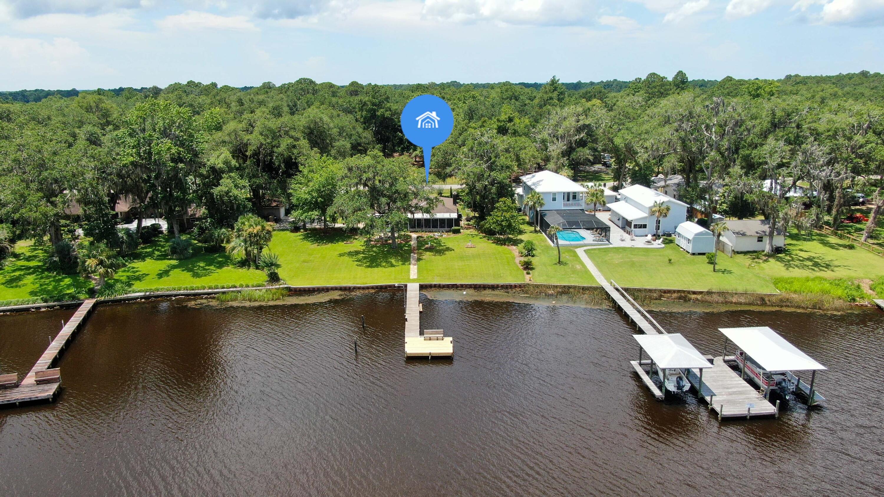 1124 Bay Grove Road Freeport, FL 32439 - Photo 1 of 37 a park with lots of tress in the background