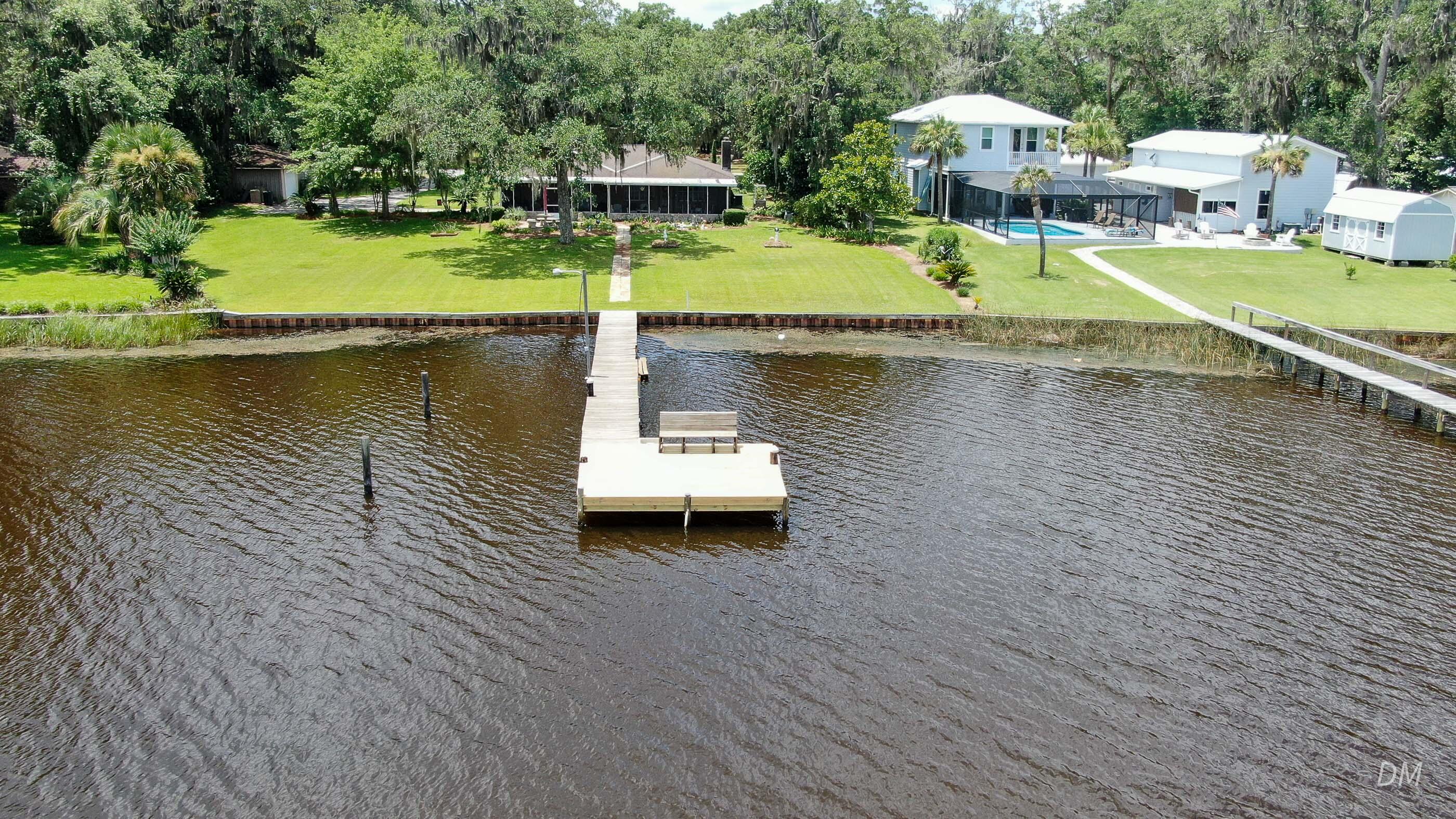 1124 Bay Grove Road Freeport, FL 32439 - Photo 4 of 37 a view of a house with a yard