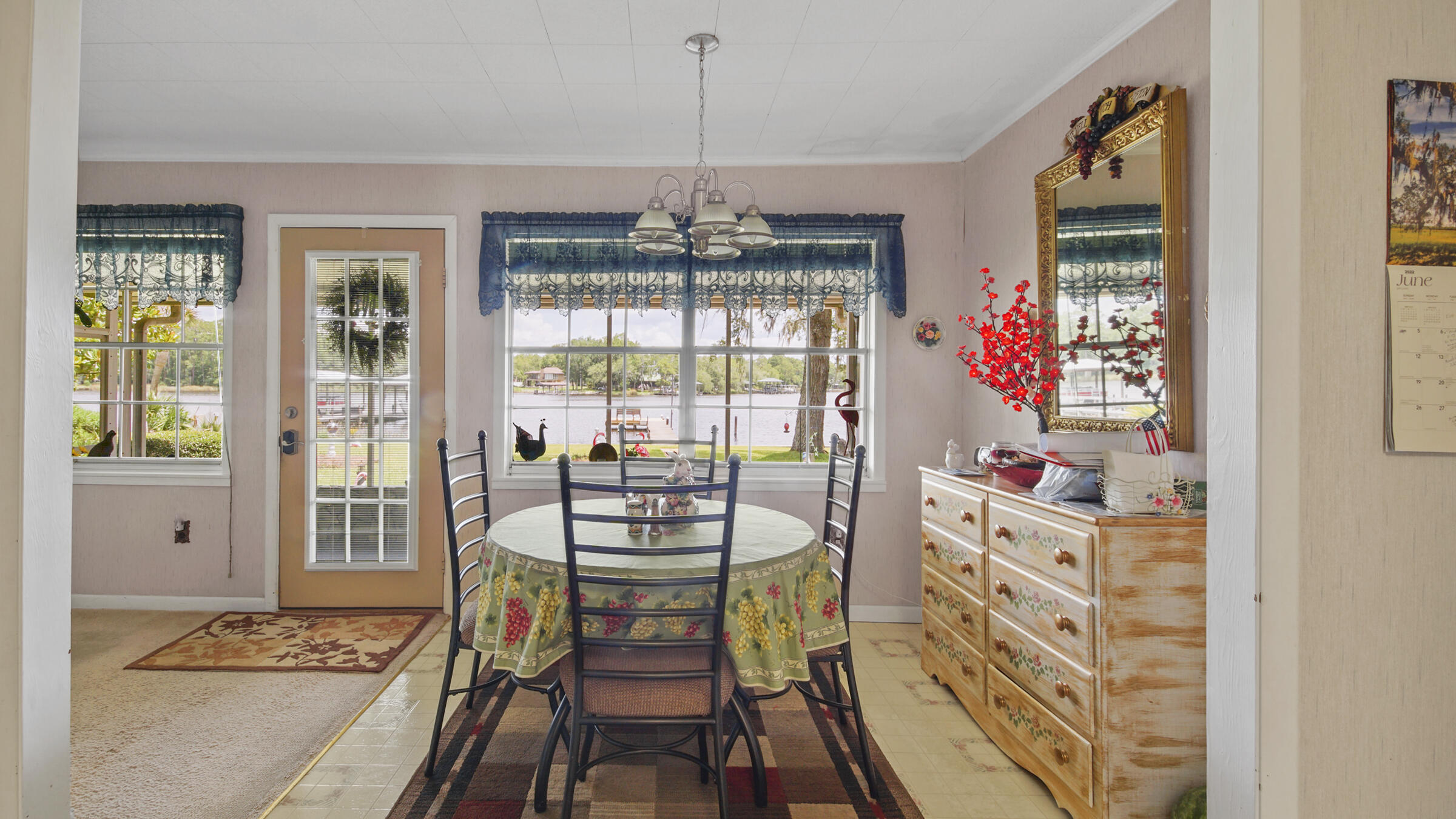 1124 Bay Grove Road Freeport, FL 32439 - Photo 9 of 37 a dining room with furniture and window