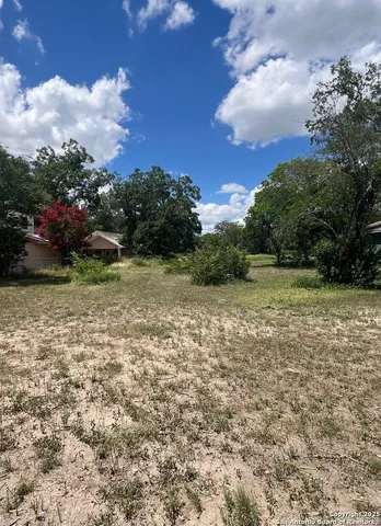 a view of a garden with an outdoor space