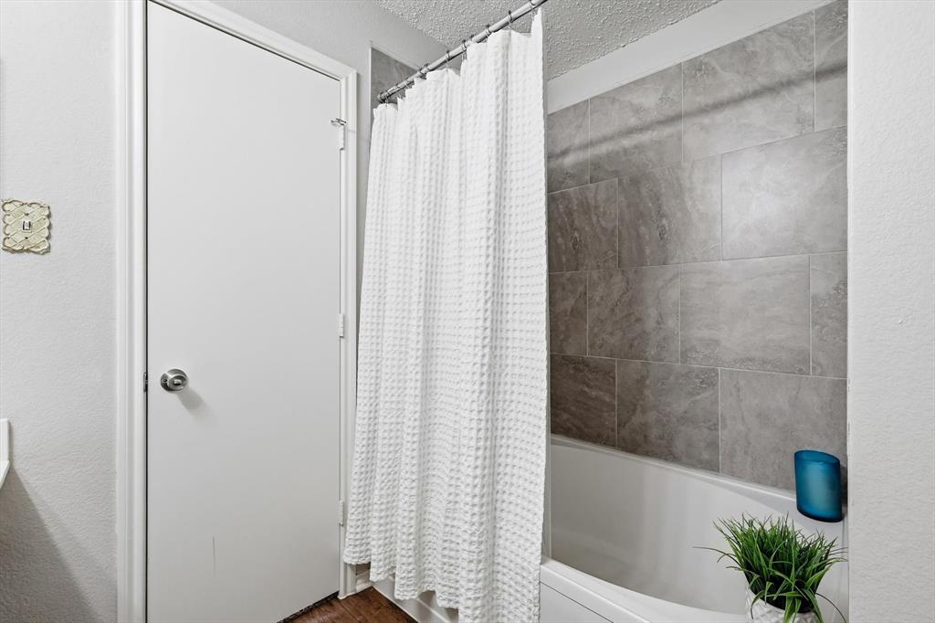 4209 Birch Creek Road Fort Worth, TX 76244 - Photo 31 of 40 primary bath has a split shower and tub.