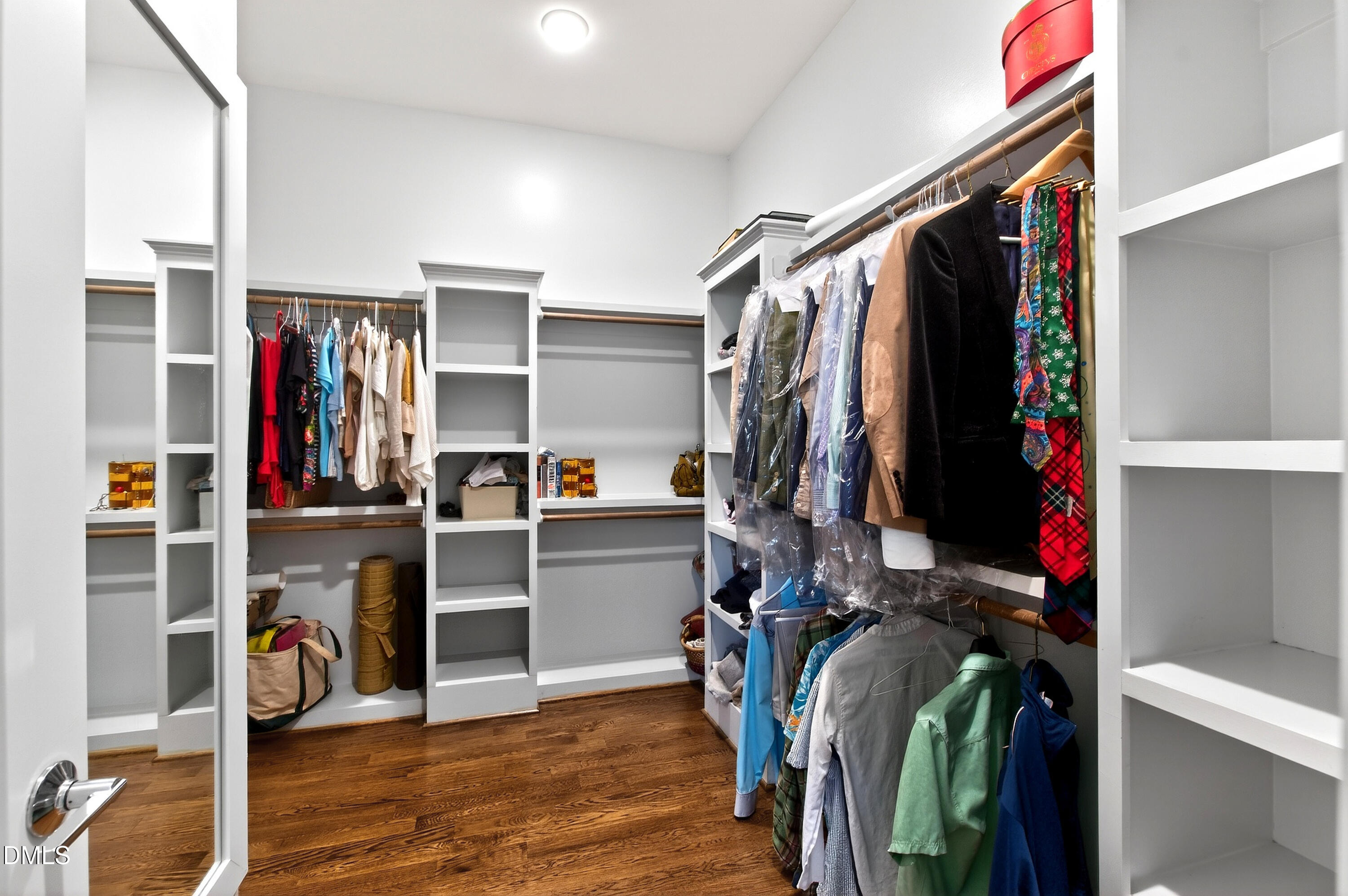 1116 Hymettus Court Raleigh, NC 27607 - Photo 27 of 69 a view of walk in closet with clothes and shoes