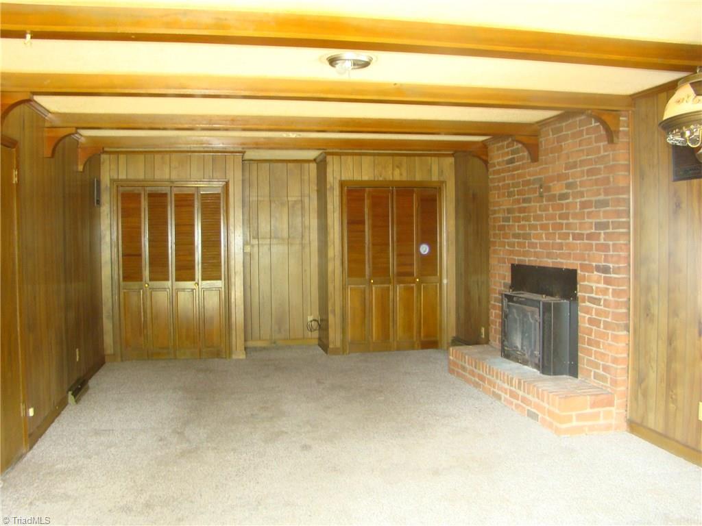 2904-2906 West English Road High Point, NC 27262 - Photo 2 of 17 Large den wood trim