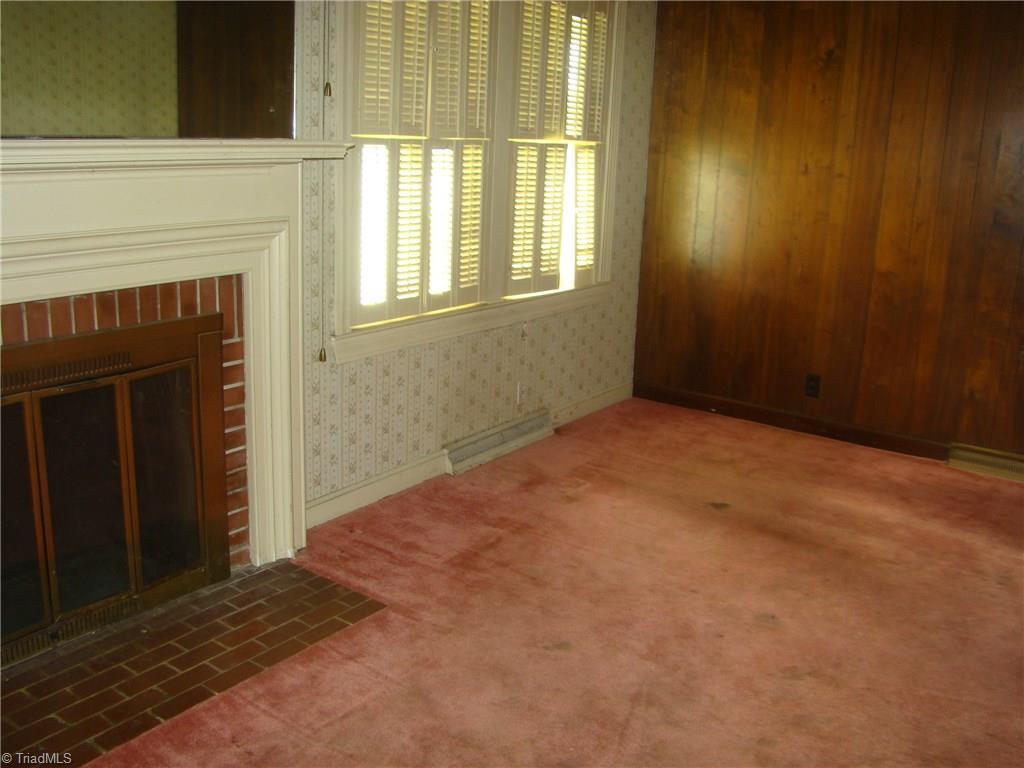 2904-2906 West English Road High Point, NC 27262 - Photo 10 of 17 Living room with custom shutters