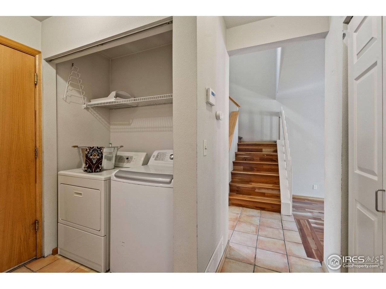 1074 Cunningham Drive, Unit 3 Fort Collins, CO 80526 - Photo 13 of 28 a kitchen with cabinets and appliances