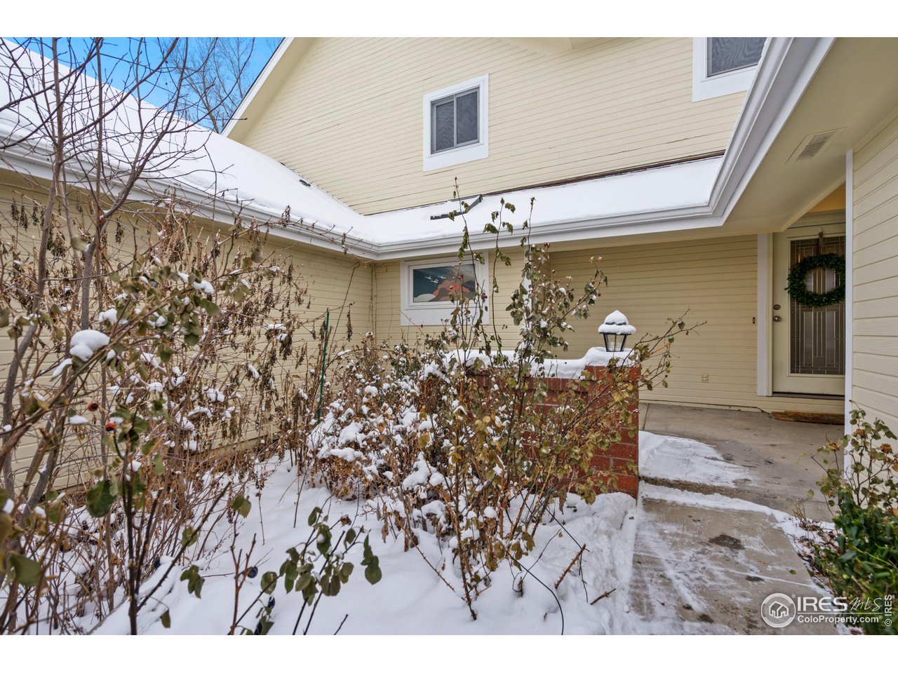 1074 Cunningham Drive, Unit 3 Fort Collins, CO 80526 - Photo 3 of 28 a view of a porch