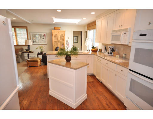 79 Levbert Road Newton, MA 02459 - Photo 11 of 21 a large white kitchen with cabinets