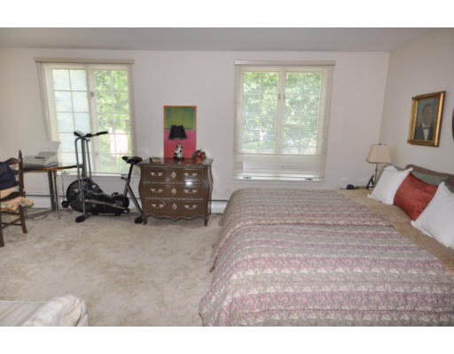 79 Levbert Road Newton, MA 02459 - Photo 12 of 21 a bedroom with a bed and a large window