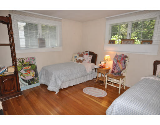79 Levbert Road Newton, MA 02459 - Photo 13 of 21 a bedroom with a bed window and table