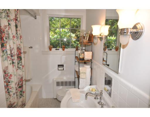 79 Levbert Road Newton, MA 02459 - Photo 15 of 21 a living room with furniture and a window