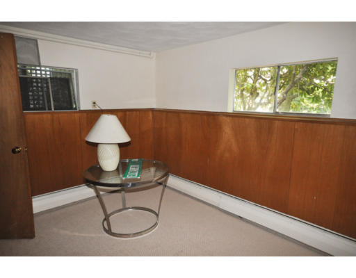 79 Levbert Road Newton, MA 02459 - Photo 17 of 21 a picture of a room with a window and a table