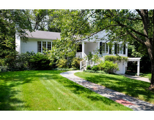 79 Levbert Road Newton, MA 02459 - Photo 2 of 21 a front view of a house with a garden
