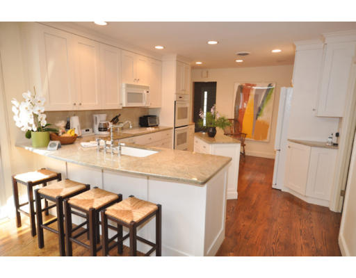 79 Levbert Road Newton, MA 02459 - Photo 3 of 21 a kitchen with a table and chairs