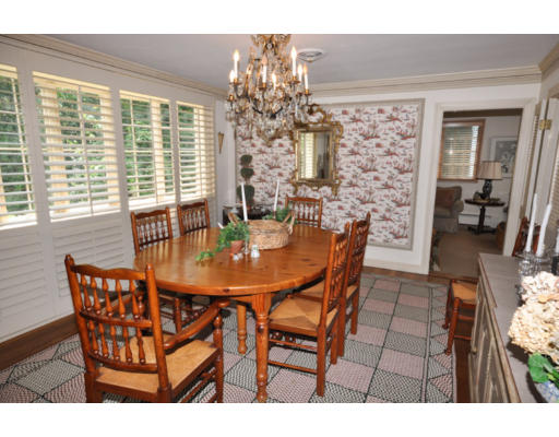 79 Levbert Road Newton, MA 02459 - Photo 6 of 21 a view of a dining room with furniture and chandelier