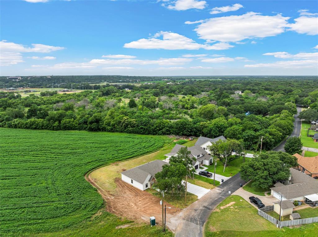5200 Bogey Lane Waco, TX 76708 - Photo 36 of 37 a view of a golf course with a garden